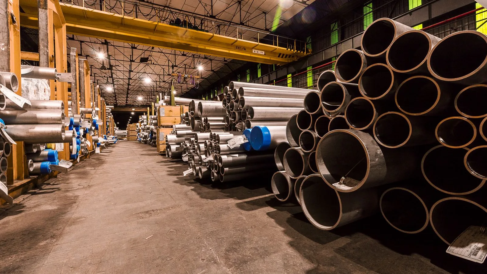 Steel pipe inventory racked in a distribution warehouse